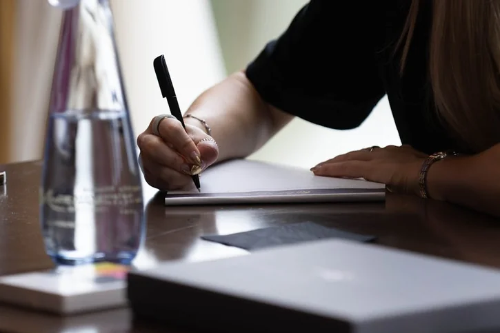 Lady Taking Notes