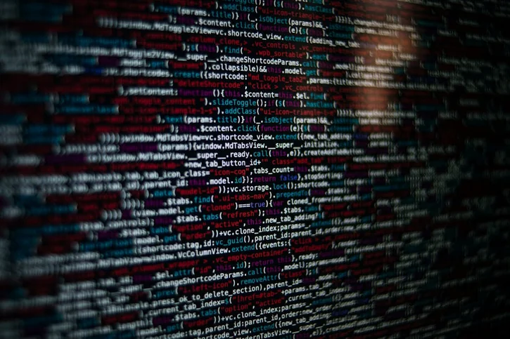 Detailed image of computer source code displayed on a screen, showcasing web development elements.